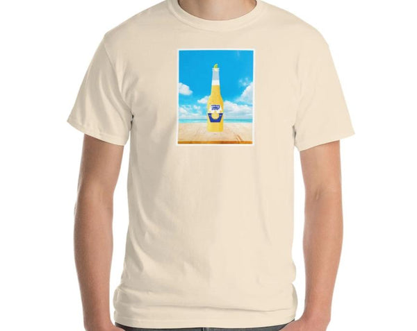 bottle of MIRYKLE on a beach natural color tee.