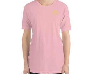 Women’s pink comfortable T-shirt with small yellow MIRYKLE Clothing Co. circle logo on lest chest.
