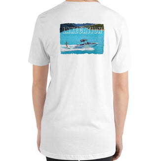 Women’s pink comfortable tshirt with a girl wakesurfing and lakecation graphic.